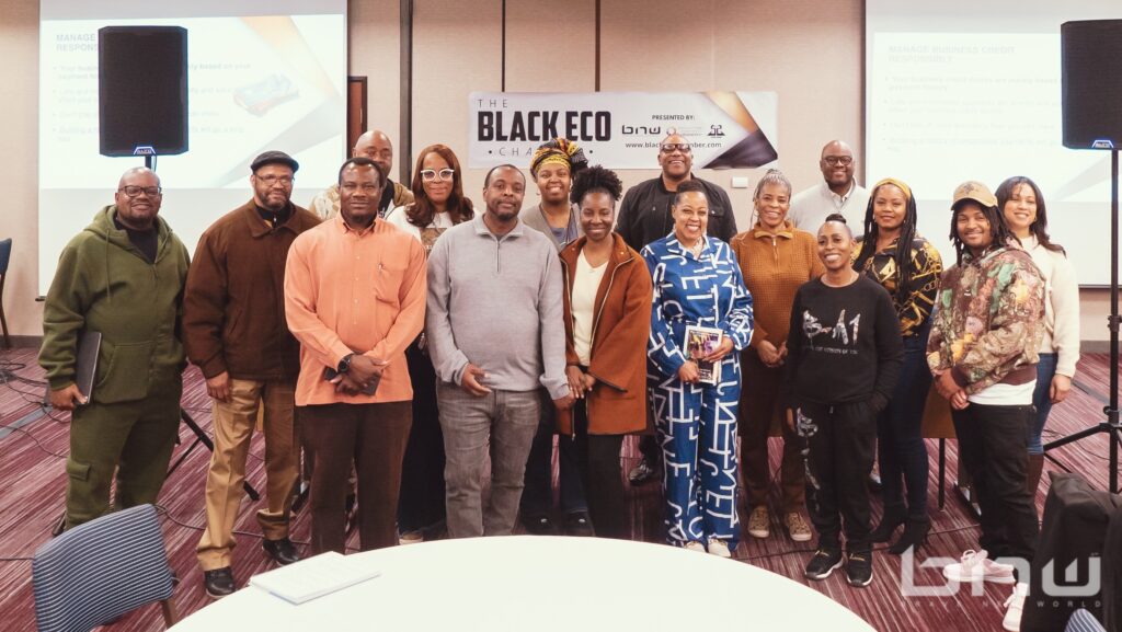 Panelists and Event staff pose with attendees at the Black Eco Chamber Corporate Credit Workshop